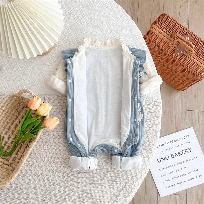 Blue corduroy romper with bow