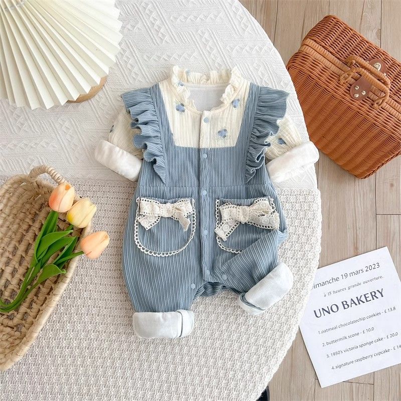 Blue corduroy romper with bow