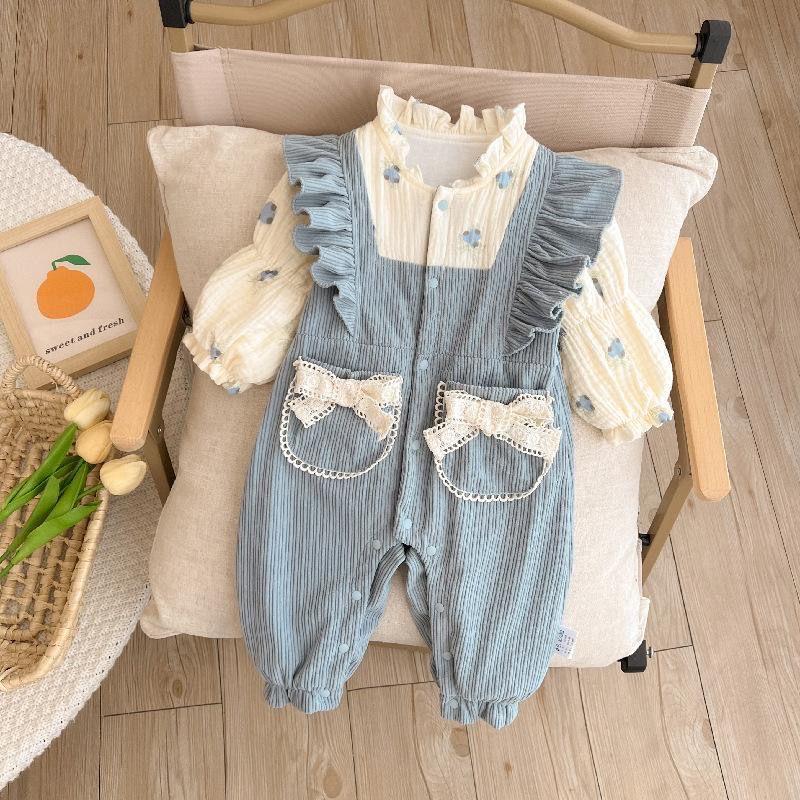Blue corduroy romper with bow