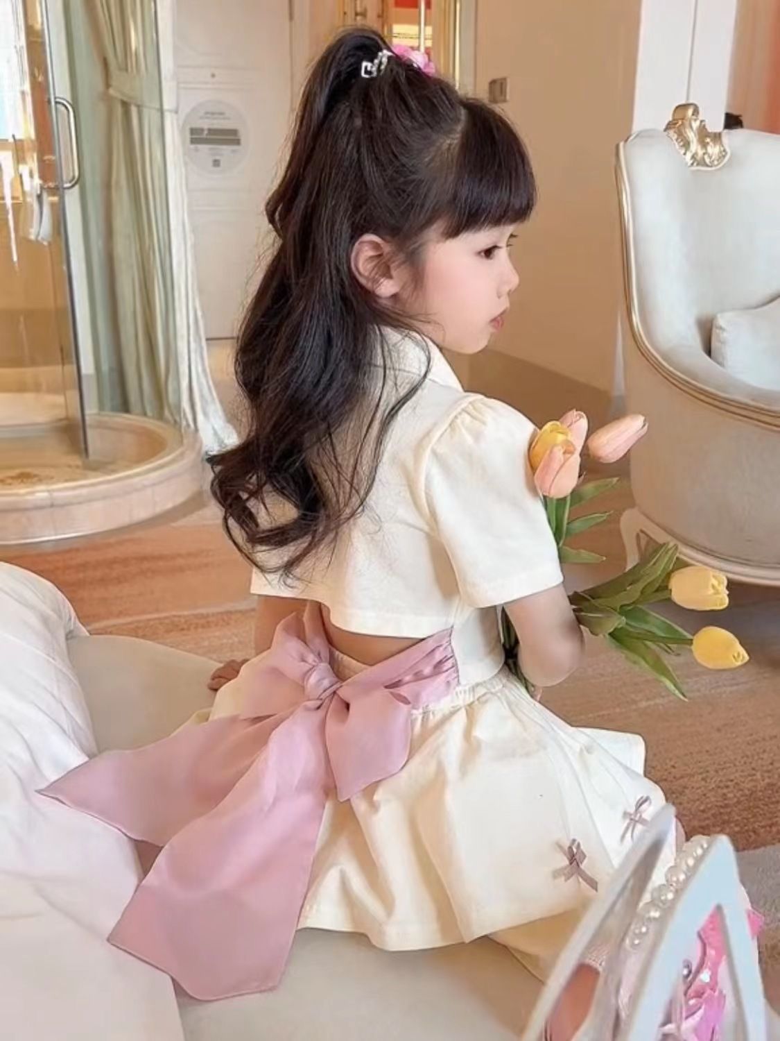 Cream 2 pc set with a Back Bow and small Bow on skirt