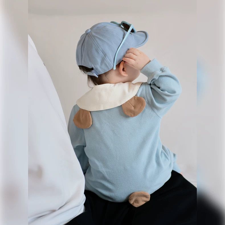 Blue cozy cub with detachable collar